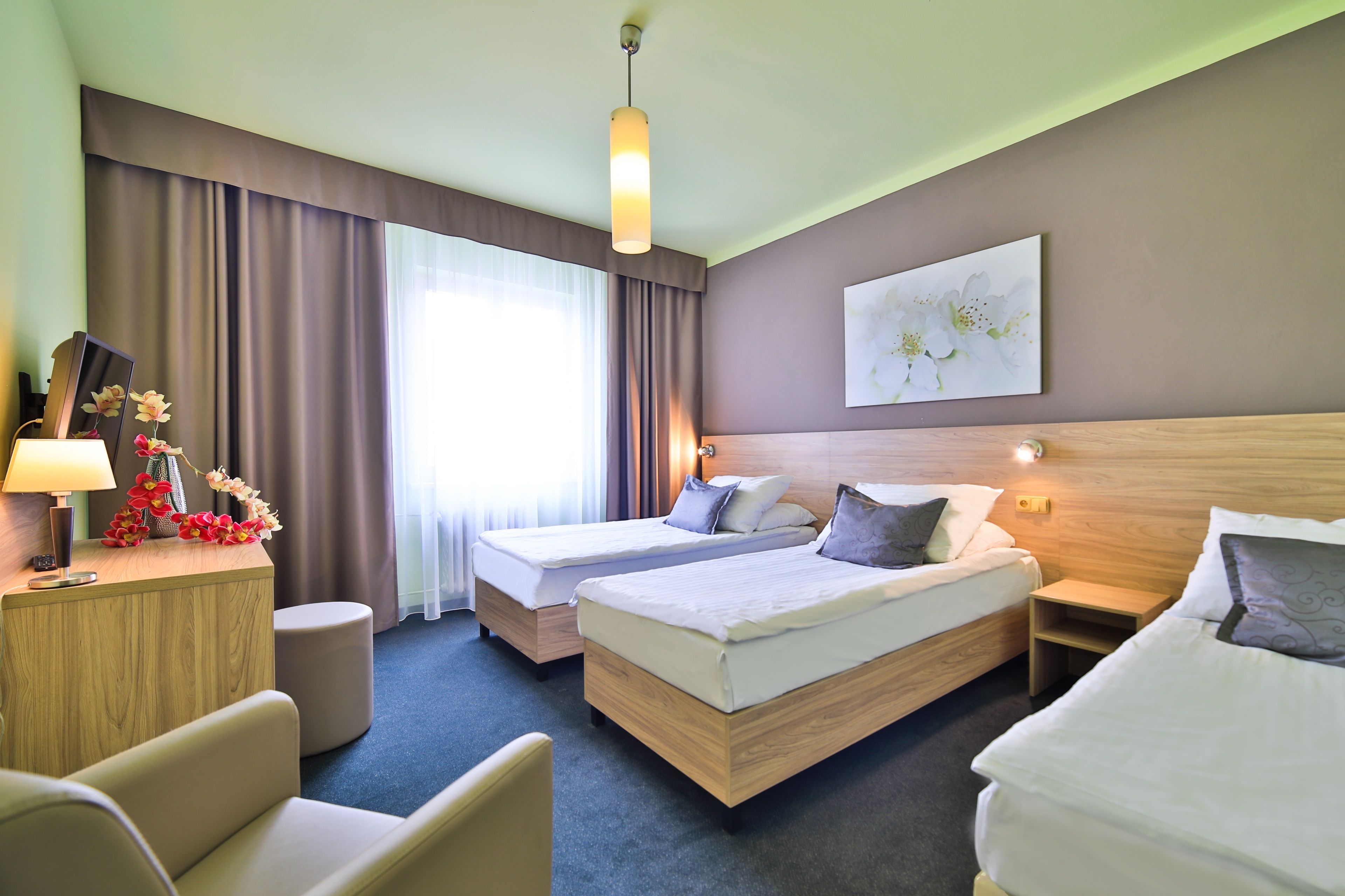 triple room | in-room safe, desk, laptop workspace, blackout curtains