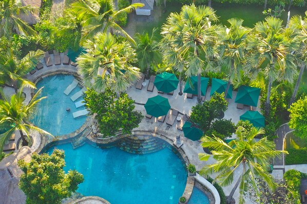 2 outdoor pools, pool umbrellas, pool loungers