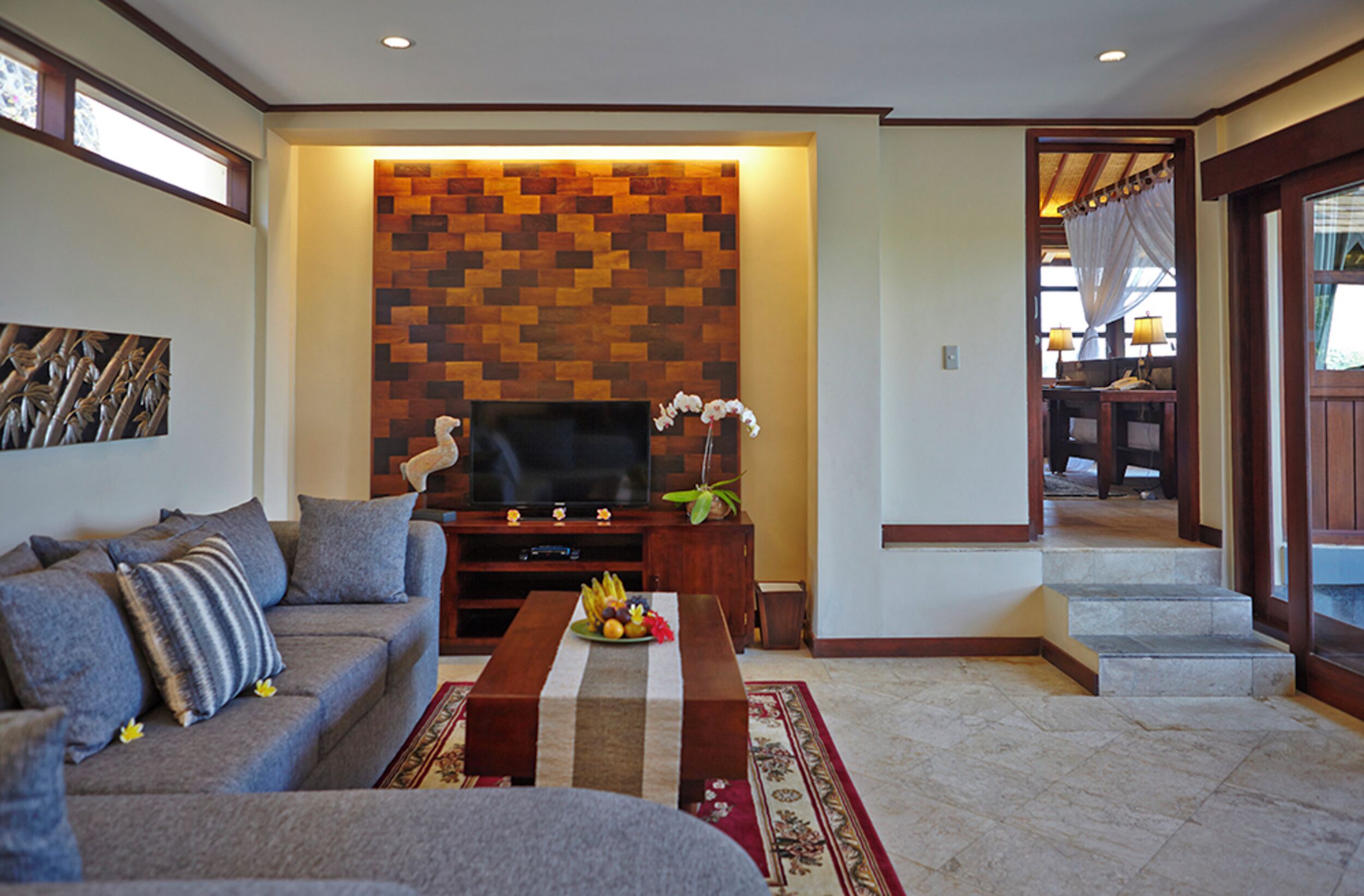 two bedroom pool villa | living room | 32-inch smart tv with digital channels, tv, dvd player
