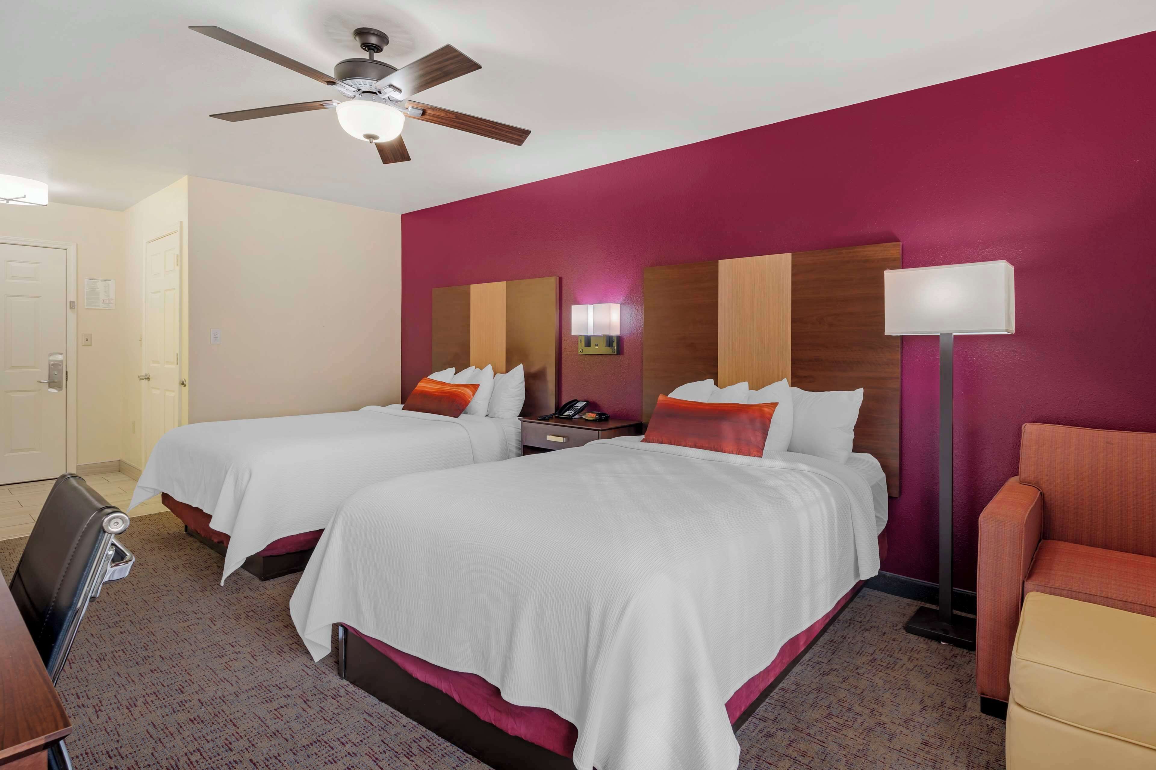 standard room, 2 queen beds, non smoking, refrigerator & microwave | in-room safe, desk, laptop workspace, iron/ironing board