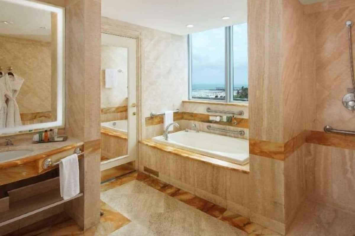Bathroom | Eco-friendly toiletries, hair dryer, bathrobes, slippers