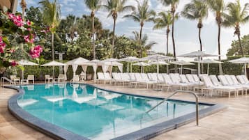 Outdoor pool, open 7:00 AM to 7:00 PM, pool umbrellas, sun loungers