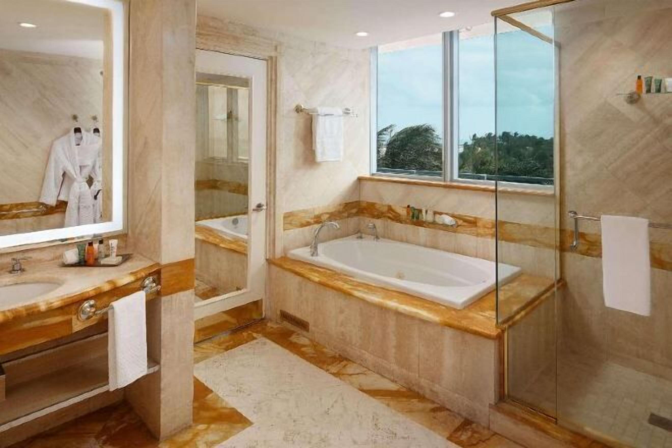 Bathroom | Eco-friendly toiletries, hair dryer, bathrobes, slippers