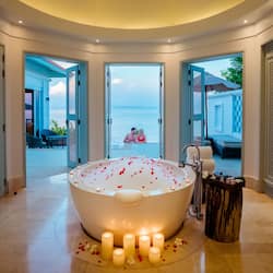 Separate tub and shower, rainfall showerhead, free toiletries