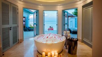 Separate bathtub and shower, rainfall showerhead, free toiletries