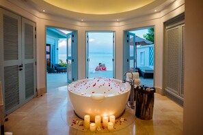 Separate tub and shower, rainfall showerhead, free toiletries