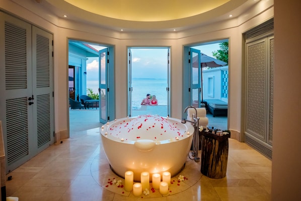 Separate tub and shower, rainfall showerhead, free toiletries