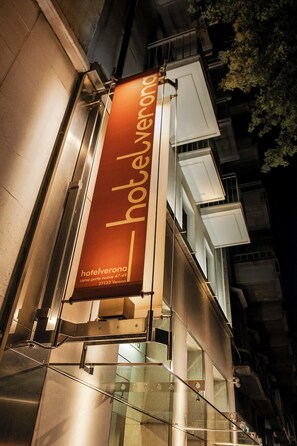 Hotel Verona is prominently marked with its illuminated sign on Corso Porta Nuova 47-49 in Verona.