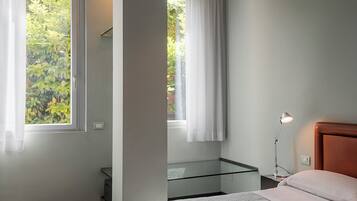 Camera familiare (Depandance) | Biancheria da letto ipoallergenica, minibar, una cassaforte in camera