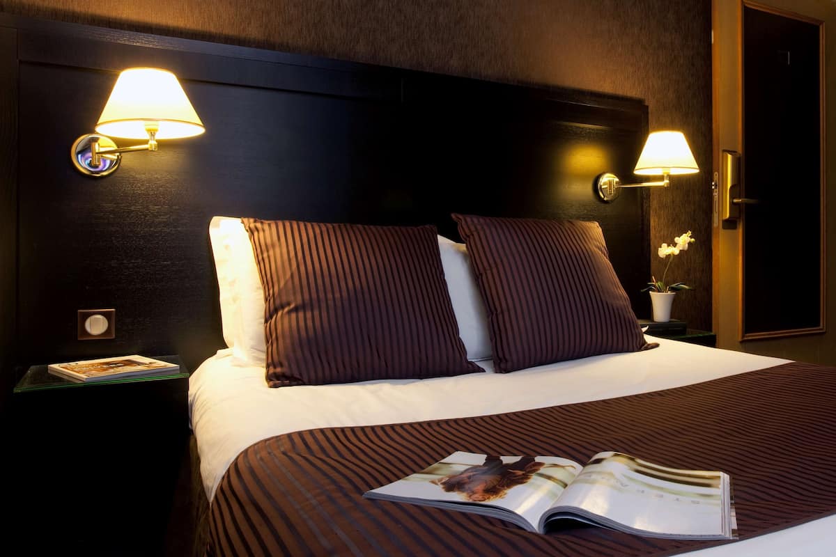 Premium bedding, pillow-top beds, free minibar, in-room safe