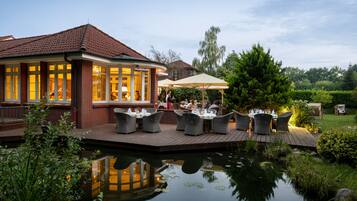 Breakfast, lunch, dinner served; local cuisine, garden views