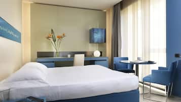 Premium bedding, down comforters, minibar, in-room safe