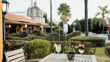 Grand Room, 2 Double Beds (Deluxe) | Terrace/patio