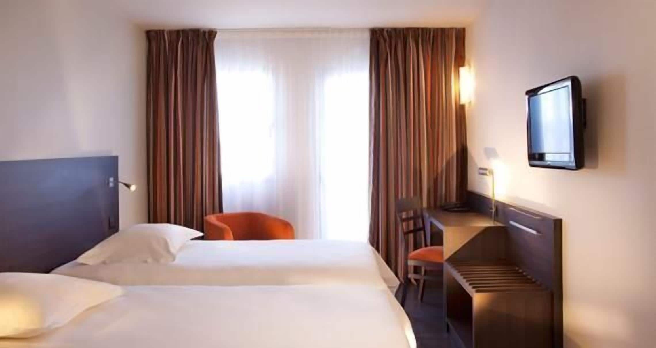 comfort twin room | desk, blackout curtains, soundproofing, iron/ironing board