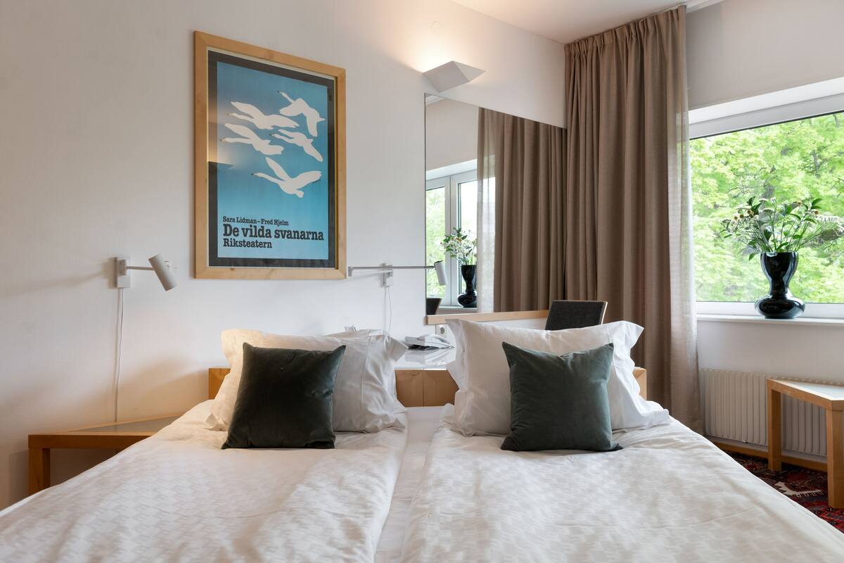 economy double or twin room | hypo-allergenic bedding, in-room safe, desk, blackout curtains