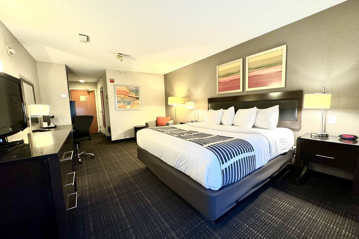 premium bedding, pillow-top beds, desk, laptop workspace