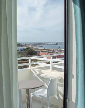 Standard Room, Balcony, Partial Sea View | Minibar, in-room safe, desk, free WiFi