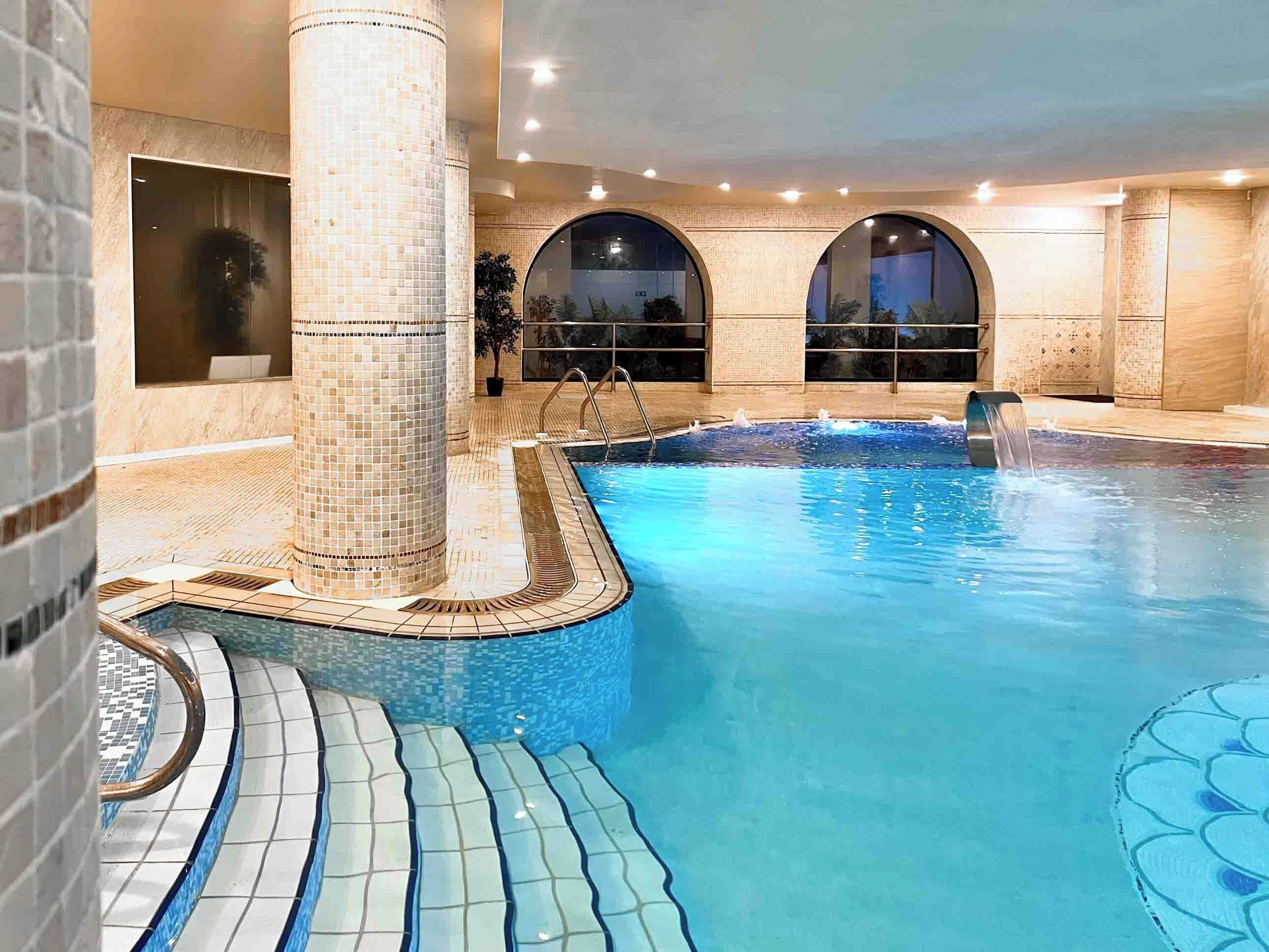 Indoor pool, seasonal outdoor pool, pool umbrellas, sun loungers