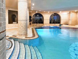 Indoor pool, seasonal outdoor pool, pool umbrellas, sun loungers