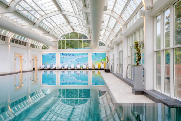 2 indoor pools, open 6:30 AM to 10:00 PM, pool loungers