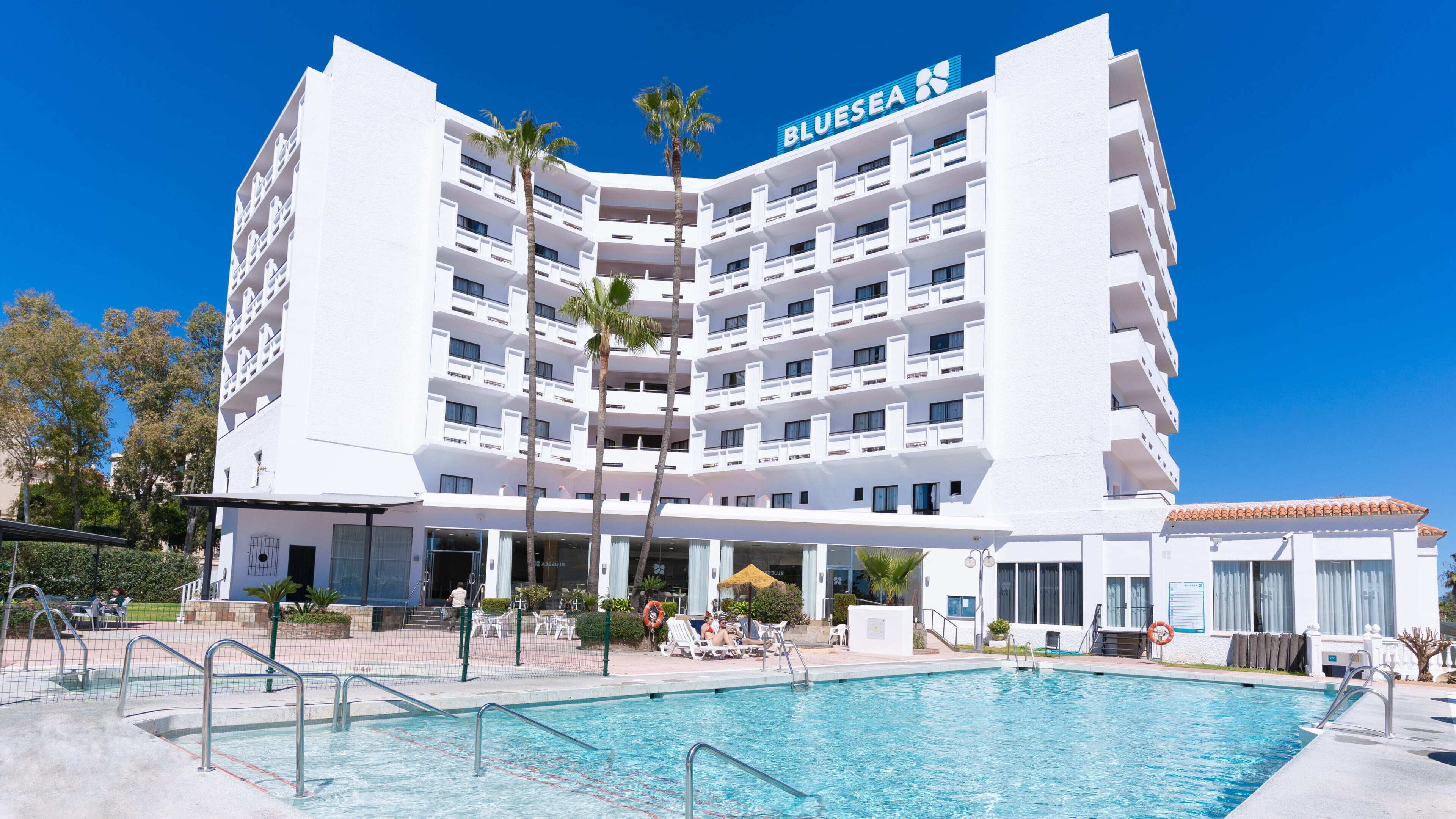 Outdoor pool, pool umbrellas, pool loungers