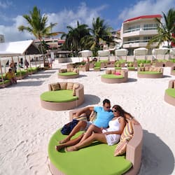 On the beach, sun-loungers, beach umbrellas, beach towels
