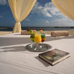 On the beach, sun loungers, beach umbrellas, beach towels