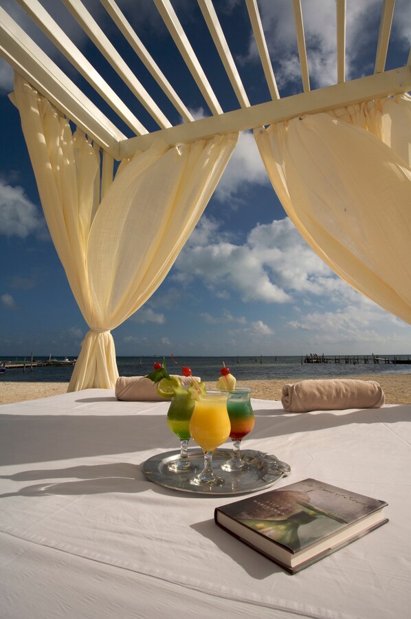 On the beach, sun loungers, beach umbrellas, beach towels