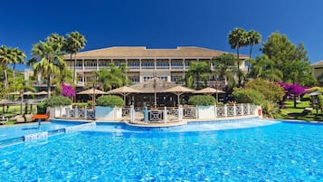 Indoor pool, outdoor pool, open 9:00 AM to 9:00 PM, pool umbrellas