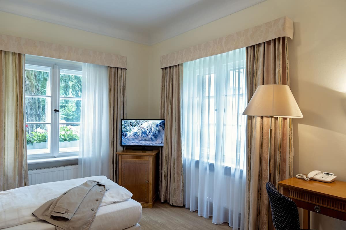 Habitación individual | Ropa de cama hipoalergénica y minibar 