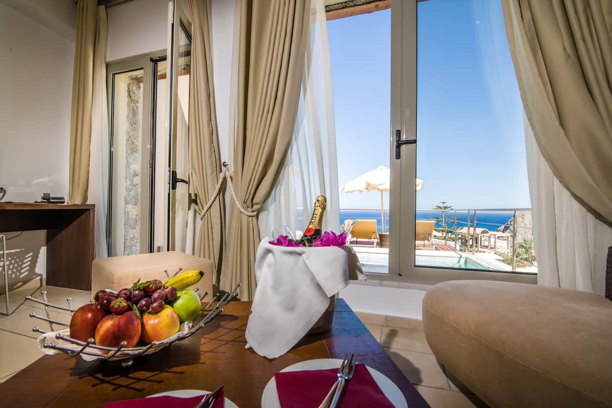Junior Suite, Private Pool | Premium bedding, minibar, in-room safe, desk