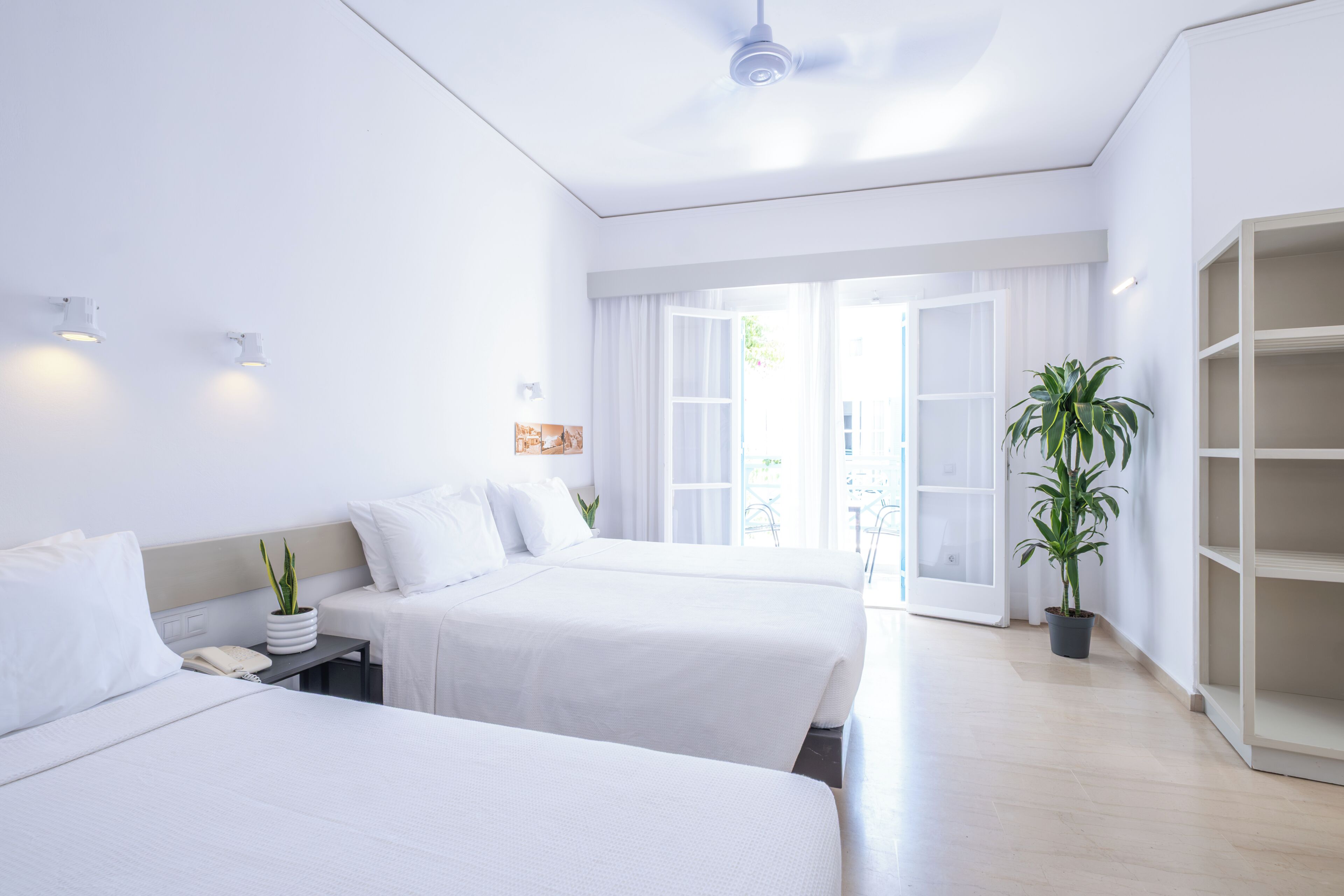 Triple Courtyard View | Premium bedding, in-room safe, cribs (free), WiFi (free)