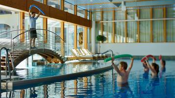 Relax by the pool, surrounded by the hotel's sleek architecture and expansive views.