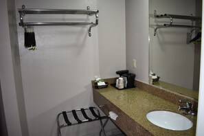 Room, 1 King Bed | Bathroom | Combined shower/tub, deep soaking tub, free toiletries, hair dryer