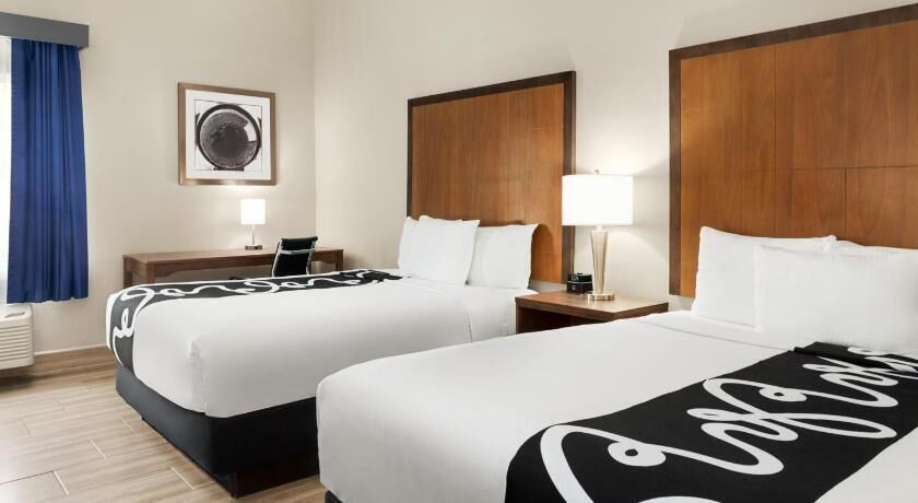 Premium bedding, down duvets, pillow-top beds, desk