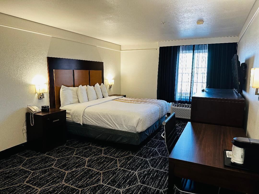 Premium bedding, desk, blackout drapes, soundproofing
