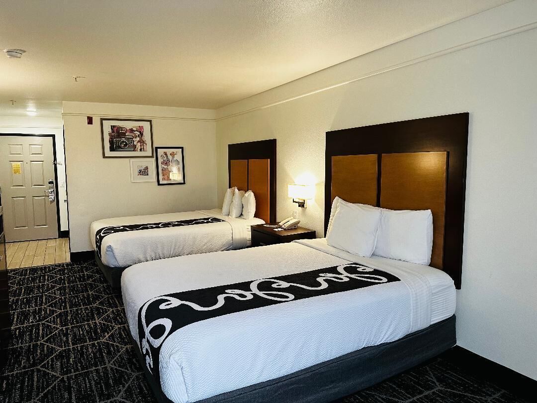 Premium bedding, desk, blackout drapes, soundproofing