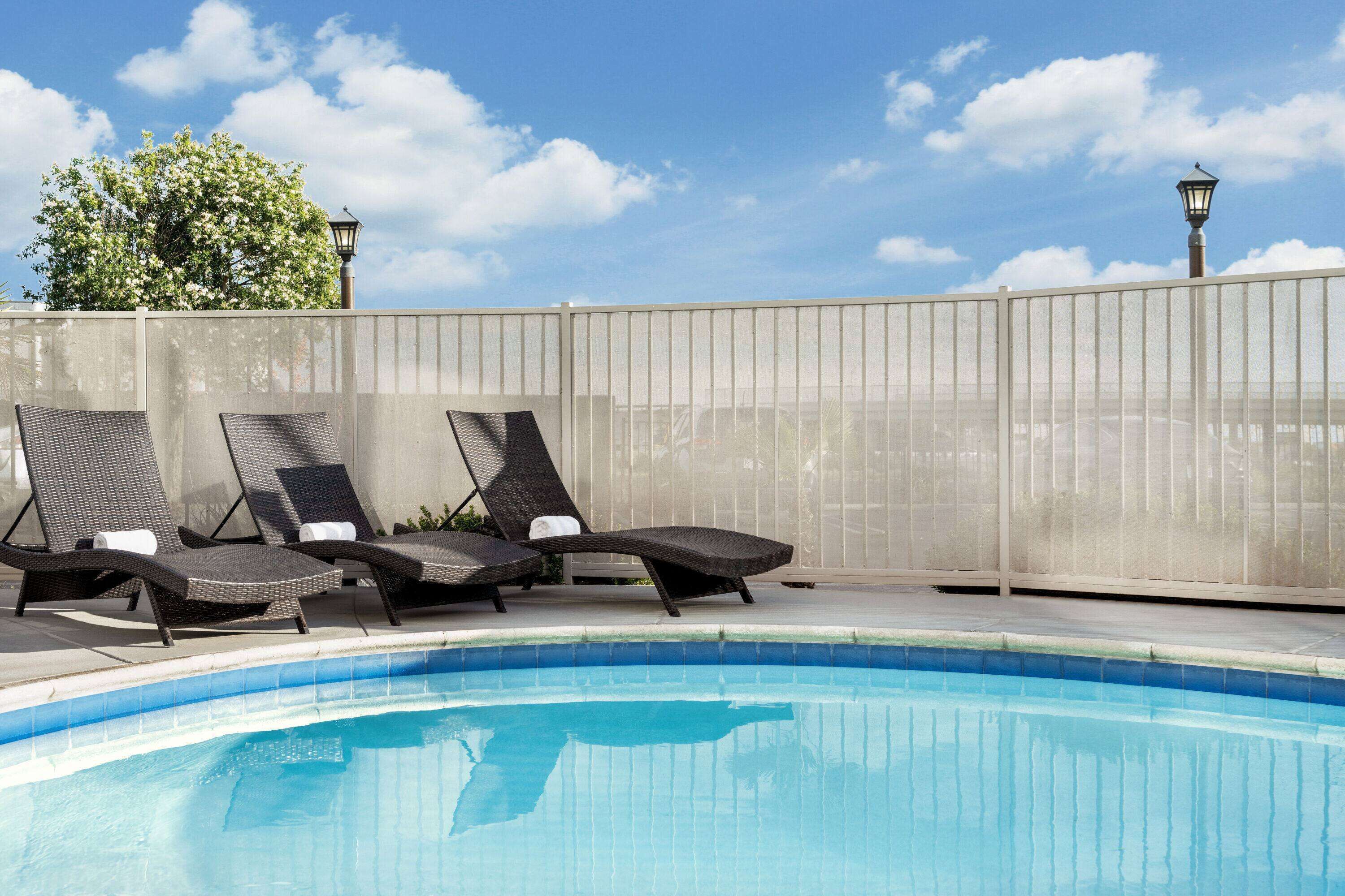 Outdoor pool, open 9:00 AM to 10:00 PM, sun loungers