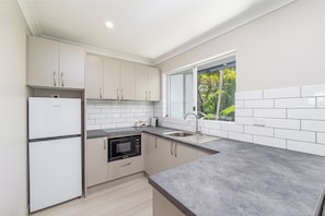 Superior Two Bed Apartment | Private kitchen | Coffee/tea maker, electric kettle