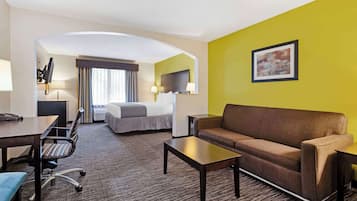 Premium bedding, desk, laptop workspace, blackout curtains