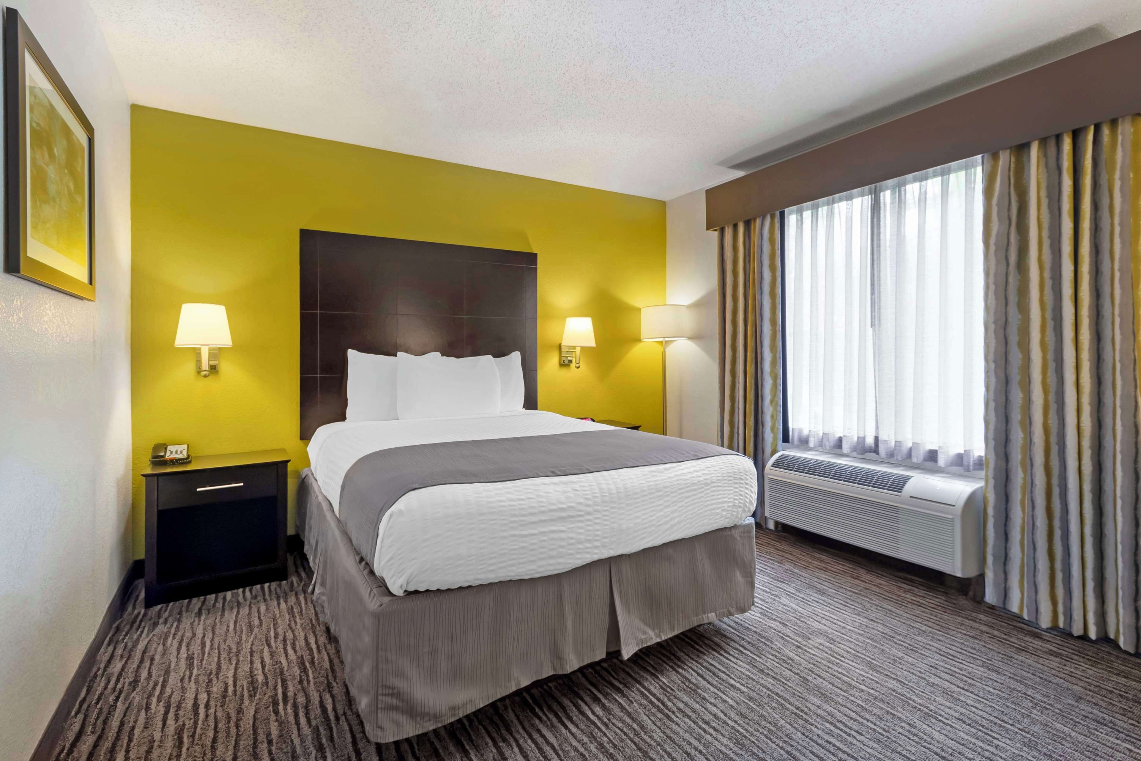 standard room, 1 queen bed, non smoking, refrigerator & microwave (small room) | premium bedding, desk, laptop workspace, blackout curtains