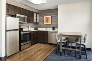 Suite, 2 Bedrooms | Private kitchen | Full-size fridge, microwave, coffee/tea maker