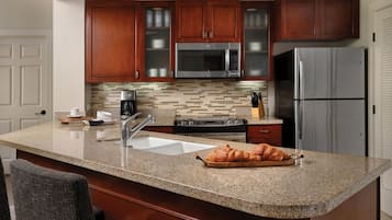 Microwave, coffee/tea maker, cookware/dishes/utensils