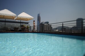 Seasonal outdoor pool, pool umbrellas, sun loungers