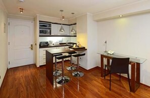 Superior Apartment, 1 Bedroom | Minibar, in-room safe, desk, blackout curtains - Time Suite - Comfort Apartments (Santiago)