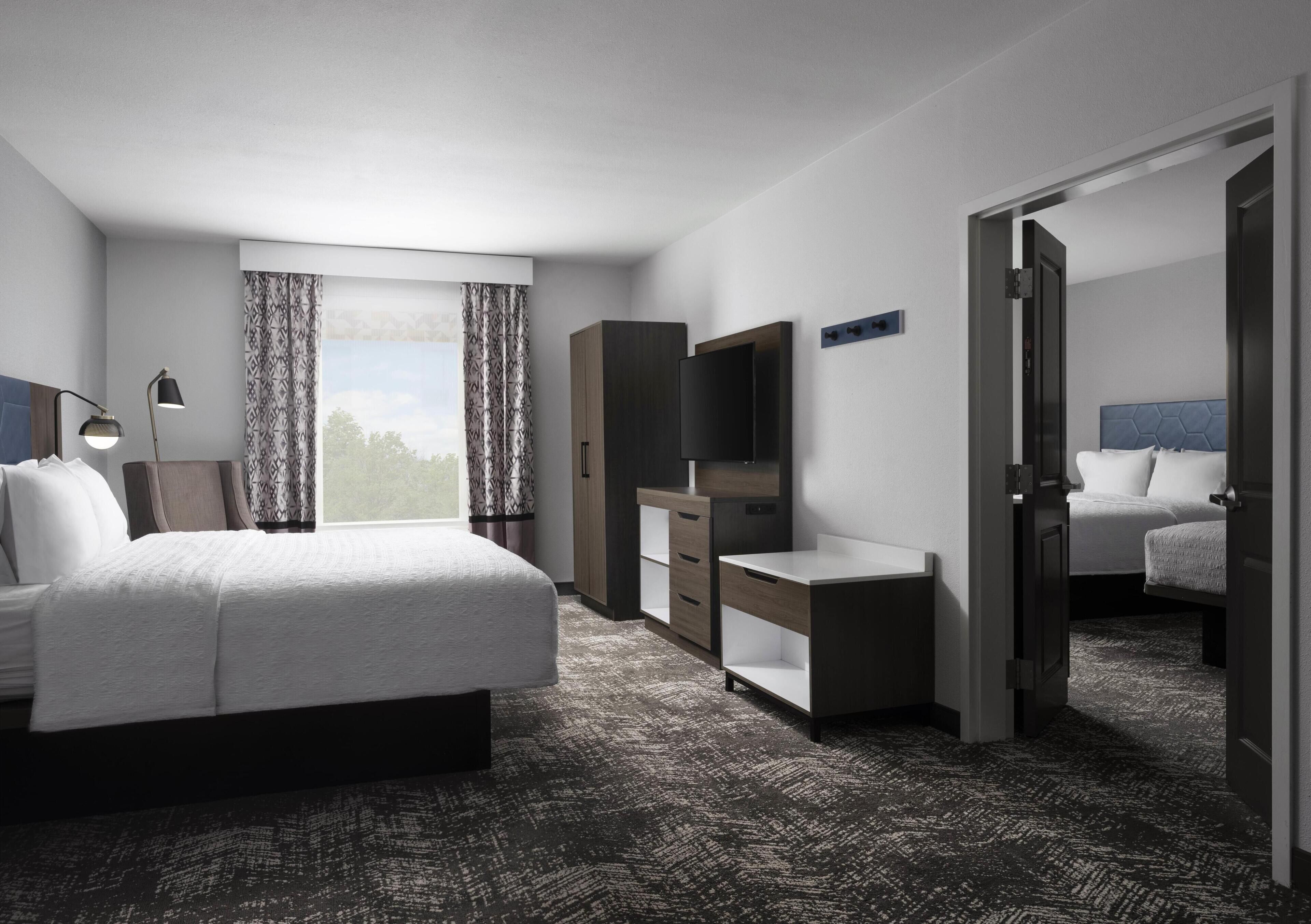 Desk, laptop workspace, blackout curtains, iron/ironing board