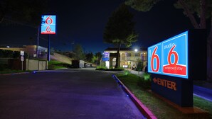 A motel sign with '6' and 'extended stay' indicating the name and type of accommodation. - Motel 6 Barstow, CA (Barstow)