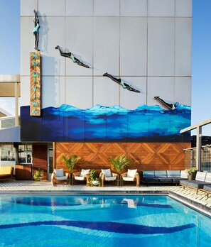 Outdoor pool, open 7:00 AM to 6:30 PM, pool umbrellas, sun loungers