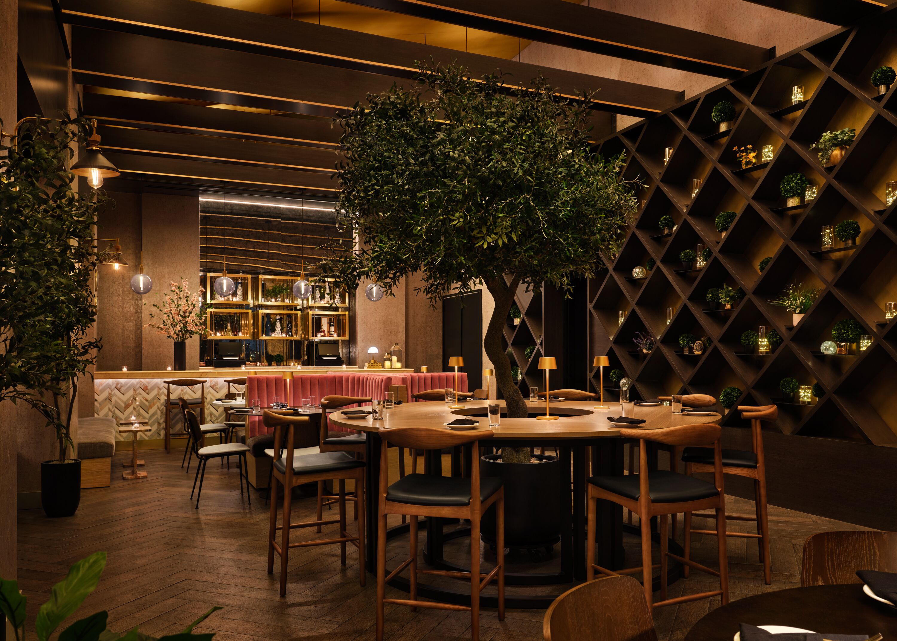 A restaurant with wooden furniture, a central table, and a decorative tree.
