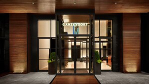 A modern building entrance with a sign reading "GANSEVOORT". - Gansevoort Meatpacking (New York)